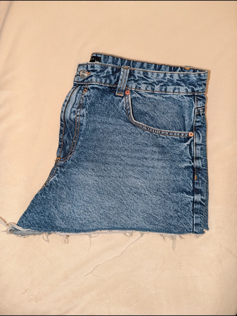 ASOS DESIGN denim relaxed shorts in midwash blue